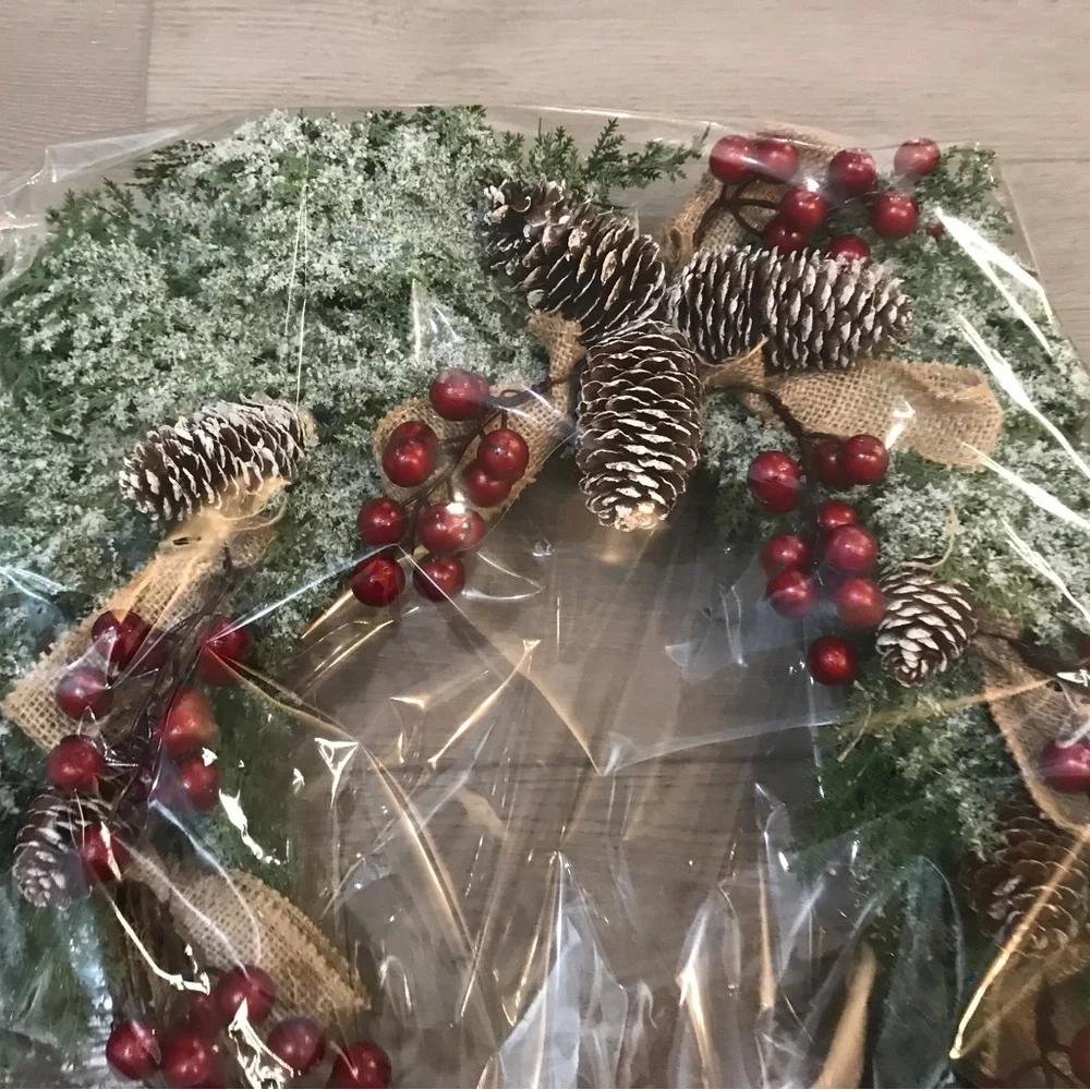 Festive Holiday Wreath with Red Berries, Pinecones and Artificial Snow
